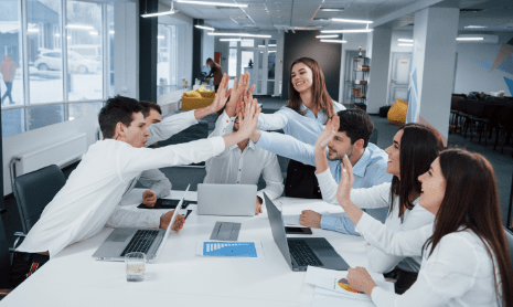 cheerful-business-people-job-is-done-group-office-workers-happy-hit-their-own-records-being-successful-min