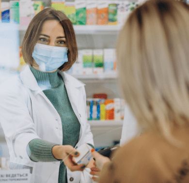 pharmasict-serving-customer-drug-store-min
